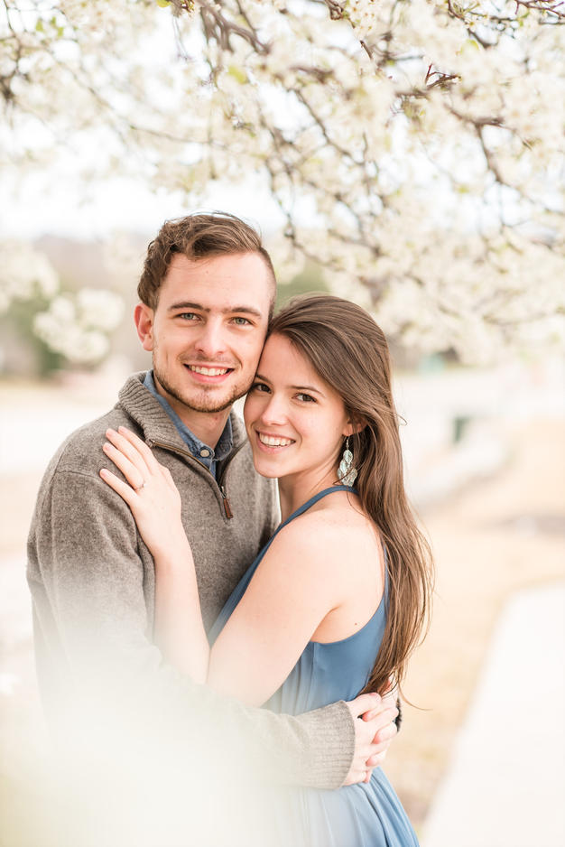 North Texas engaged couple with spring blooms