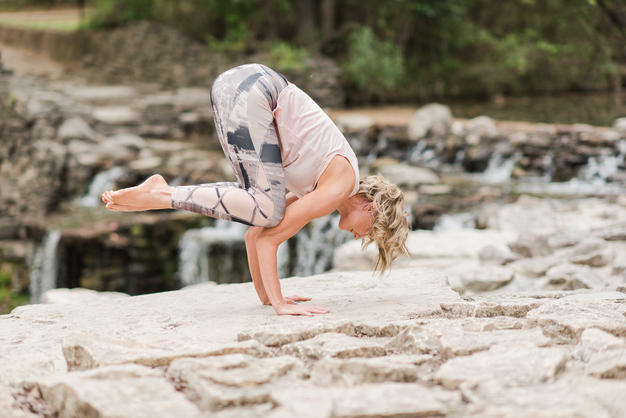 woman doing yoga at Prairie Creek Park in Richardson, TX