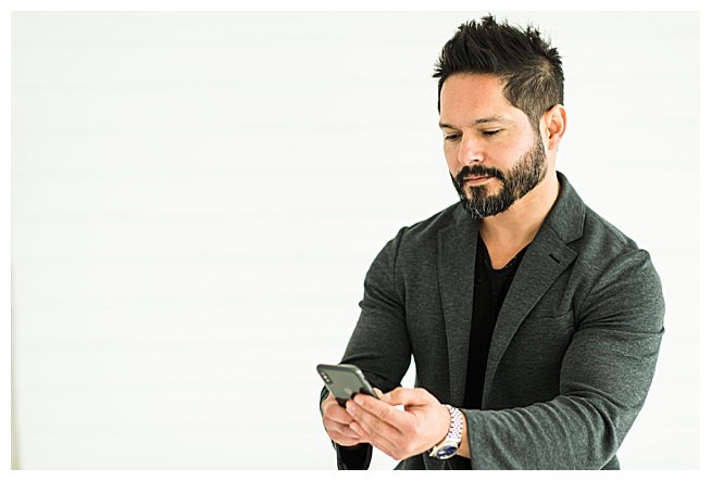 man checking text messages
