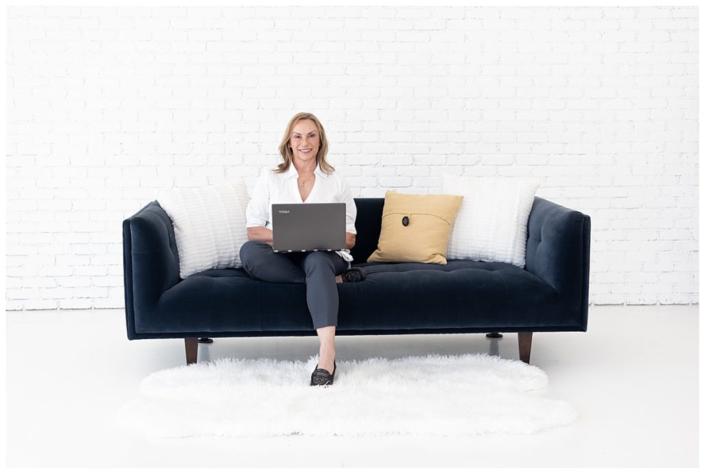 entrepreneur on couch with laptop