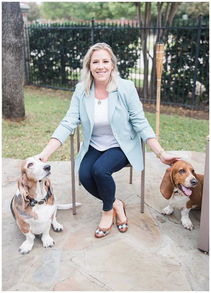 lifestyle image of woman with blazer on and dogs in Grand Praire, TX